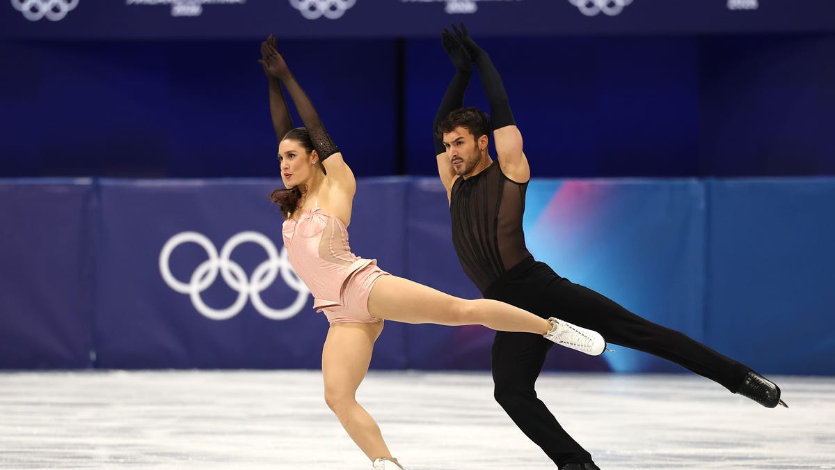 MILAN, ITALY - FEBRUARY 06: Laurence Fournier Beaudry and partner Guillaume Cizeron of Team France compete in the Ice Dance - Rhythm Dance on day zero of the Milano Cortina 2026 Winter Olympic games at Milano Ice Skating Arena on February 06, 2026 in Milan, Italy. (Photo by Matthew Stockman/Getty Images)