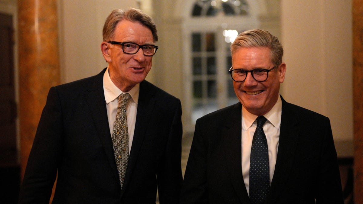 British Prime Minister Keir Starmer talks with Britain's ambassador to the United States Peter Mandelson during a welcome reception at the ambassador's residence on February 26, 2025, in Washington, DC, U.S.