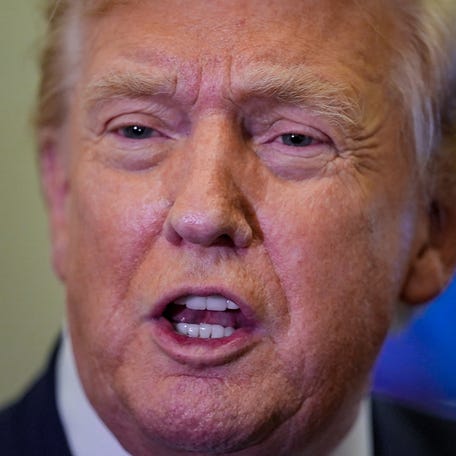 President Donald Trump speaks with reporters on board Air Force One en route to Palm Beach, Florida, on Feb. 6, 2026.