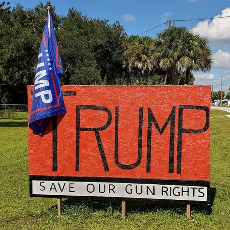 A sign in Palm Beach, Florida, in 2020 supports Donald Trump and the Second Amendment.