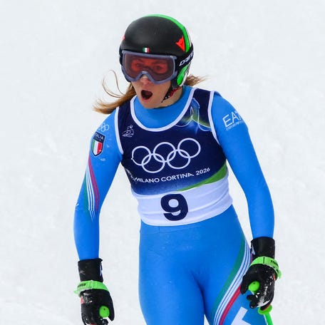 Italy's Sofia Goggia reacts after crashing in the downhill run of the women's team combined event during the Milano Cortina 2026 Winter Olympic Games on Feb. 10, 2026.