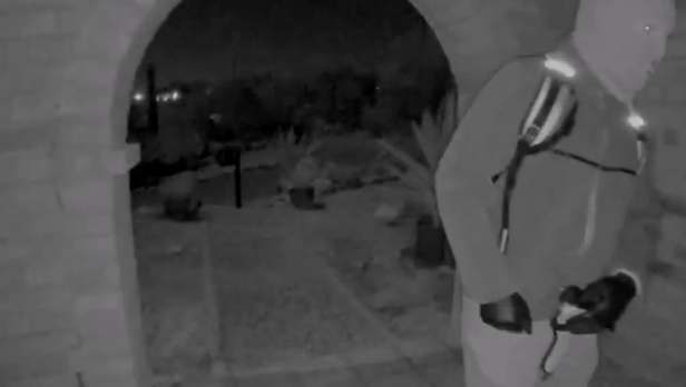 New images from a Nest camera show an armed individual appearing to have tampered with the camera at Nancy Guthrie's front door on the morning of her disappearance.