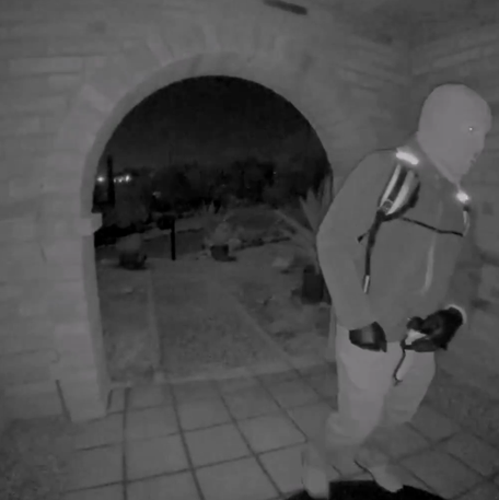 New images from a Nest camera show an armed individual appearing to have tampered with the camera at Nancy Guthrie's front door on the morning of her disappearance.