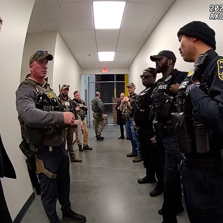 Bodycam shows confusion during Fulton County election hub raid.