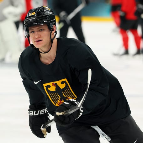 MILAN, ITALY - FEBRUARY 09: Tim StÃ¼tzle #18 of Team Germany participates during training on day three of the Milano Cortina 2026 Winter Olympic games at Milano Santagiulia Ice Hockey Arena on February 09, 2026 in Milan, Italy. (Photo by Bruce Bennett/Getty Images)