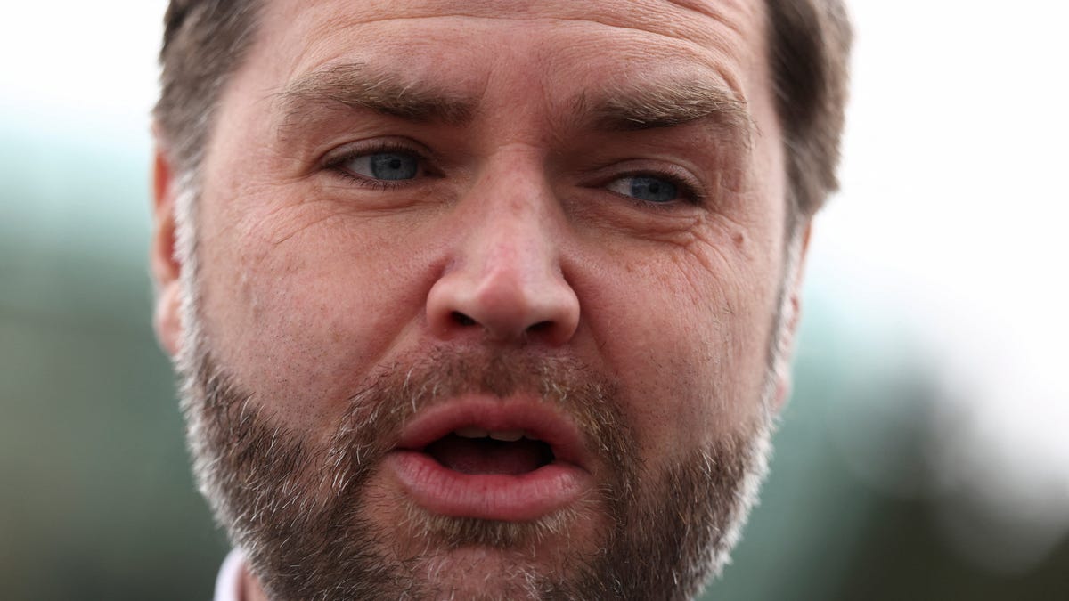 Vice President JD Vance speaks to the media before he boards Air Force Two to depart for Washington, in Baku, Azerbaijan, February 11, 2026.