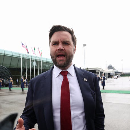 U.S. Vice President JD Vance speaks to the media before he boards Air Force Two to depart for Washington, in Baku, Azerbaijan, February 11, 2026.