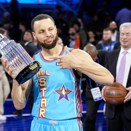 Shaq's OGs guard Stephen Curry (30) of the Golden State Warriors celebrates with the MVP trophy after defeating Chuck's Global Stars during the 2025 NBA All-Star Game at Chase Center on February 16, 2025.