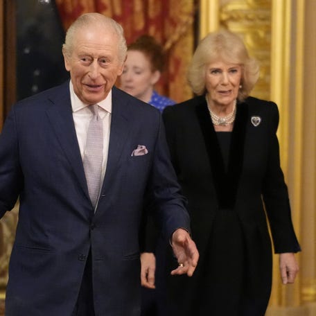Britain's King Charles and Queen Camilla attend a reception to highlight the inspirational work of paid and unpaid carers at Windsor Castle, Berkshire, Britain, Feb. 11, 2026.