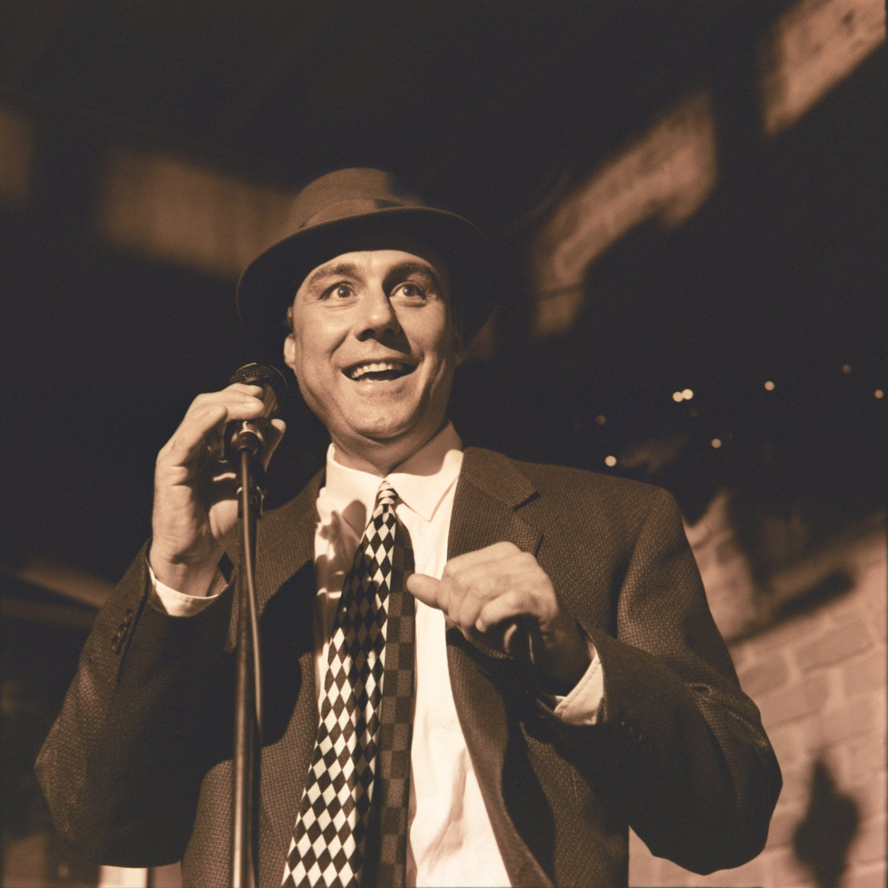 Mark Randisi went from karaoke to a career, spreading smiles whether he was playing tiny clubs or in front of big bands.