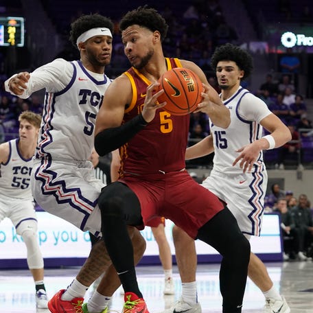 Iowa State forward Joshua Jefferson (5) makes a move on TCU forward Micah Robinson (5) during their game at Ed and Rae Schollmaier Arena.