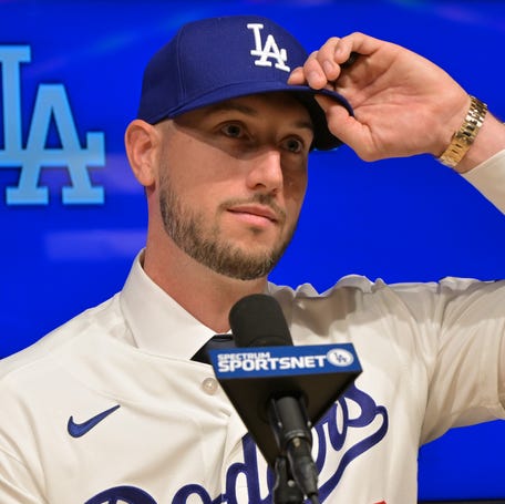 Los Angeles Dodgers right fielder Kyle Tucker is introduced to the media during a press conference at Dodger Stadium on Jan. 21, 2026.