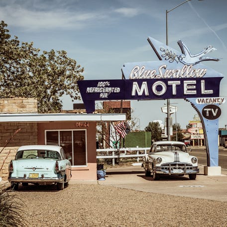 Landscapes and iconic architecture of Road 66 featuring historic motels gas stations vintage signs abandoned buildings and cars along the roadside reflecting the golden age of the American road trip and the gradual decline of small towns crossed by the former main route in Tucumcari New Mexico United States on April 28, 2019. (Photo by Grichka BEYSSON-LEANDRI / Hans Lucas / AFP via Getty Images)