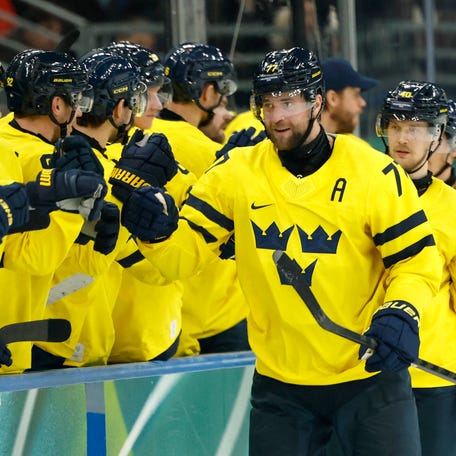 Feb 11, 2026; Milan, Italy; Victor Hedman of Sweden celebrates scoring their fifth goal with teammates in men's ice hockey group B play during the Milano Cortina 2026 Olympic Winter Games at Milano Santagiulia Ice Hockey Arena. Mandatory Credit: Geoff Burke-Imagn Images