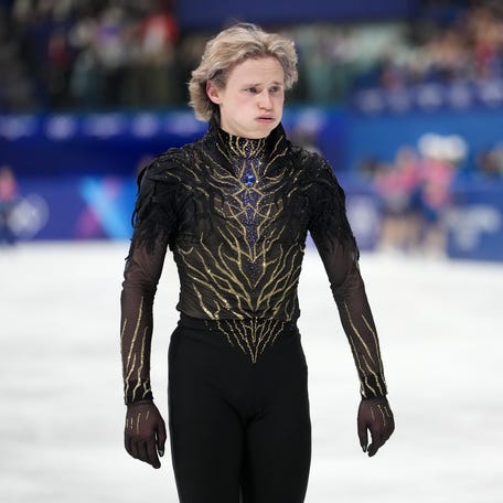 Ilia Malinin of the United States of America reacts after competing in the men's singles free program during the Milano Cortina 2026 Olympic Winter Games at Milano Ice Skating Arena.