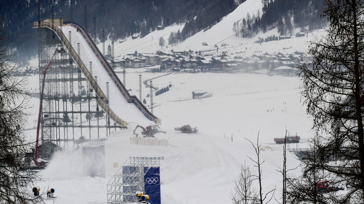 This photograph taken on January 13, 2026 shows the specially designed curved ramp for the ski jump and the snow park in Livigno, which will host all snowboard and freestyle skiing events as part of Milano Cortina 2026 Olympic Games.