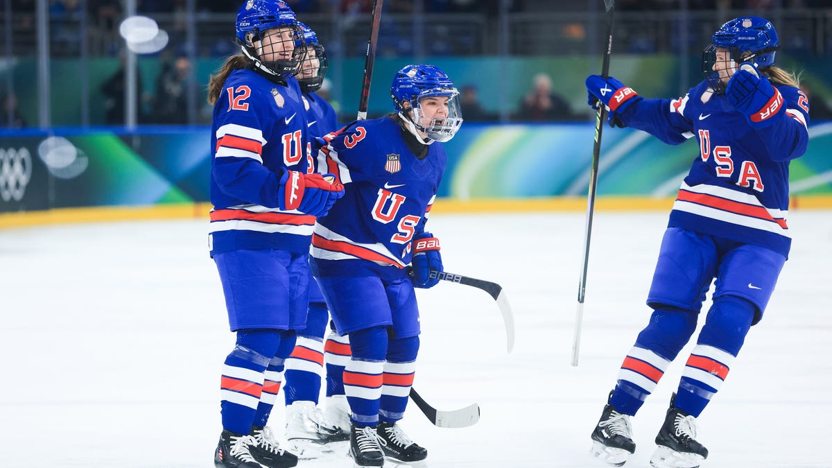 Feb 16, 2026; Milan, Italy; Cayla Barnes (3) of the United States celebrates after scoring a goal during the first period against Swedenin a women's ice hockey semifinal during the Milano Cortina 2026 Olympic Winter Games at Milano Santagiulia Ice Hockey Arena. Mandatory Credit: Katie Stratman-Imagn Images