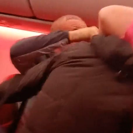 A violent brawl forced a Jet2 flight from Antalya to divert to Brussels as two unruly passengers were arrested.