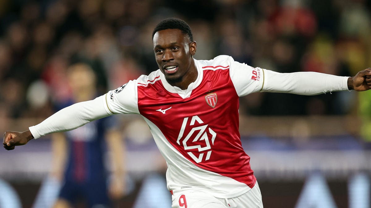 Monaco's US forward #09 Folarin Balogun celebrates scoring his team's first goal during the UEFA Champions League knockout round play-off first leg football match between AS Monaco and Paris Saint-Germain at Stade Louis II in the Principality of Monaco on February 17, 2026.