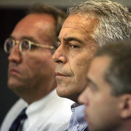In this July 30, 2008 file photo, Jeffrey Epstein is shown in custody in West Palm Beach, Florida.