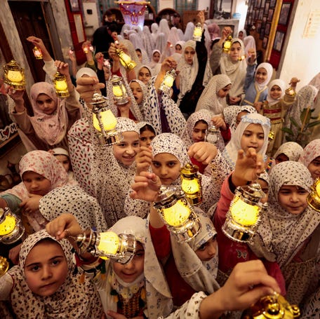 Children celebrate the start of the holy month of Ramadan in Mosul, Iraq, on Feb. 17, 2026. Ramadan is a period of prayer, reflection and abstinence that coincides with the ninth month of the Islamic calendar, which depends on the lunar cycle. It ends with the celebration of Eid al-Fitr. During the month of Ramadan, Muslims observe a fast from dawn to sunset, meaning they do not eat or drink at all during daylight hours.