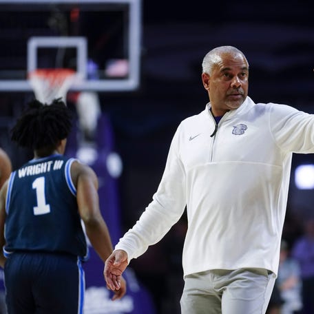Kansas State Wildcats head coach Jerome Tang brings his players in during the game against BYU Cougars inside Bramlage Coliseum on Jan. 3, 2026.