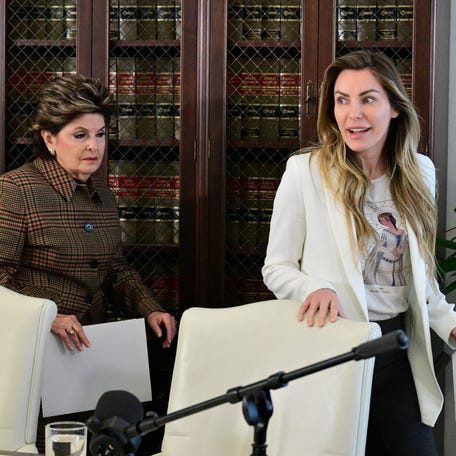 Attorney Gloria Allred and Crystal Hefner arrive at a press conference to announce steps they're taking to protect sexual images and information about women in Hugh Hefner's personal scrapbooks and diary in Los Angeles on Feb. 17, 2026.