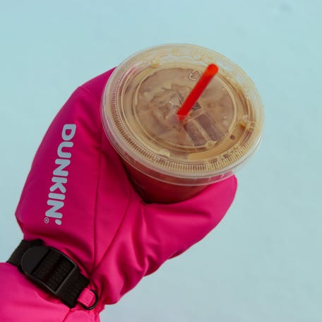 Dunkin' is giving customers who purchase an iced drink on Friday, Feb. 20 an iced coffee glove while supplies last.