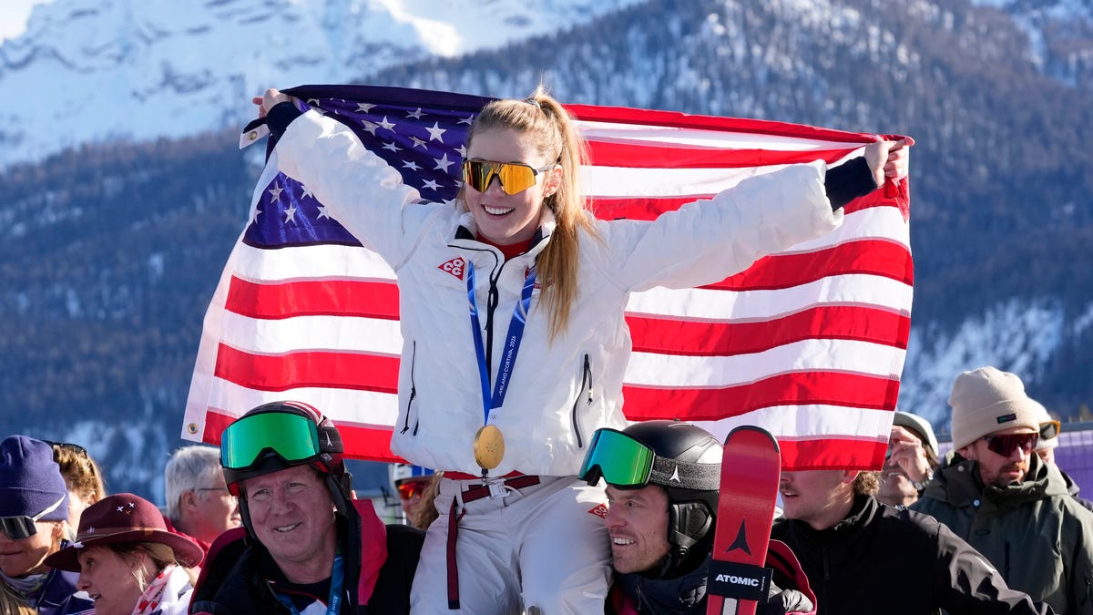 Feb 18, 2026; Cortina d'Ampezzo, Italy; Gold medalist Mikaela Shiffrin of the United States celebrates after the women's slalom during the Milano Cortina 2026 Olympic Winter Games at Tofane Alpine Skiing Centre. Mandatory Credit: Michael Madrid-Imagn Images