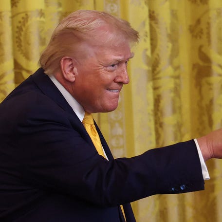 U.S. President Donald Trump points during a Black History Month reception at the White House in Washington, D.C., U.S., February 18, 2026.