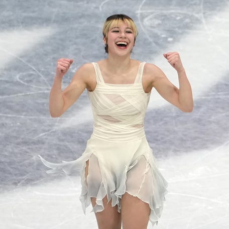 Feb 17, 2026; Milan, Italy; Alysa Liu (24) of the United States competes in the womens figure skating short program during the Milano Cortina 2026 Olympic Winter Games at Milano Ice Skating Arena. Mandatory Credit: James Lang-Imagn Images