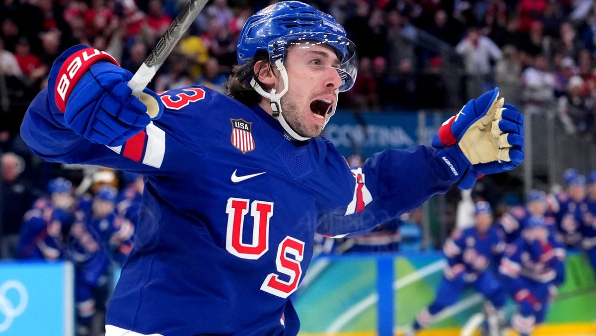 USA defenseman Quinn Hughes celebrates his overtime goal against Sweden.