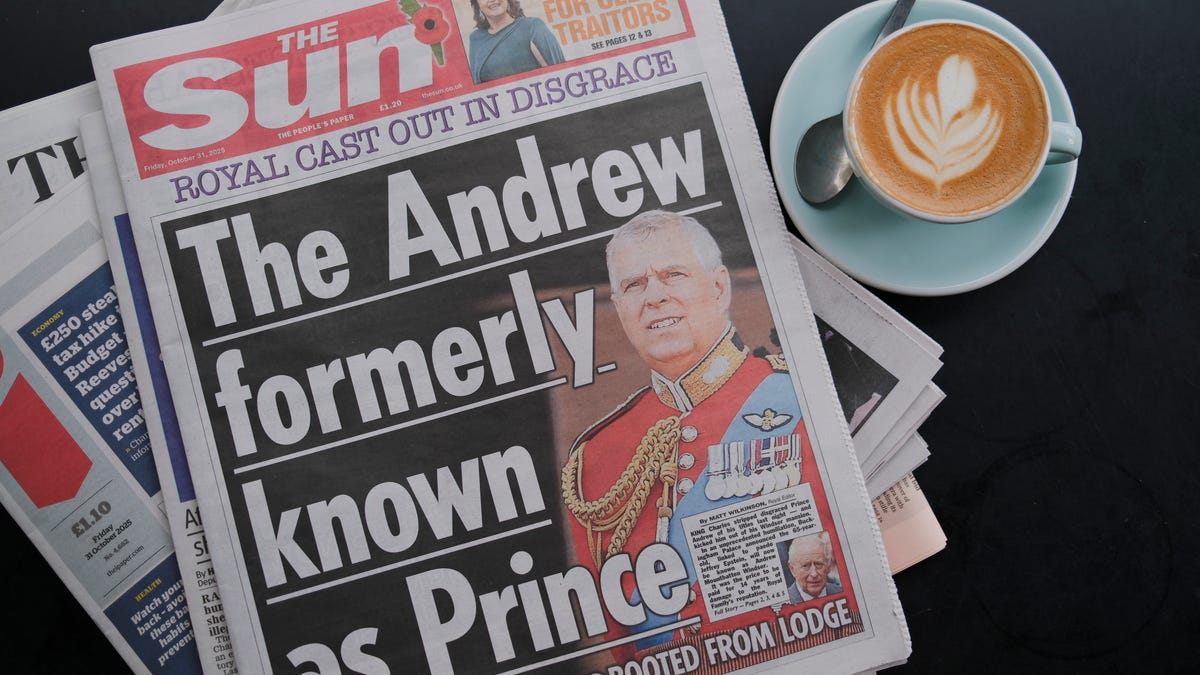 In this photo illustration, the front page of The Sun newspaper with an image of Andrew Mountbatten Windsor is seen on October 31, 2025 in Windsor, England.