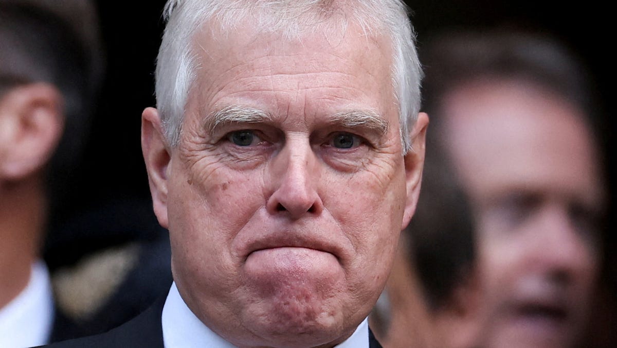 The former Prince Andrew reacts at the end of the Requiem Mass, on the day of the funeral of Britain's Katharine, Duchess of Kent, at Westminster Cathedral in London, Sept. 16, 2025.