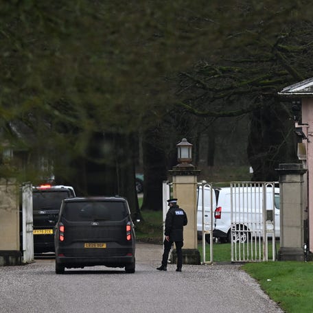 Unmarked Police vehicles enter the gates of the Royal Lodge, Andrew Mountbatten-Windsor's former residence in Windsor Great Park, February 19, 2026 in Windsor, England. The former Prince Andrew was arrested today at his new residence on the Sandringham estate on suspicion of misconduct in public office. In a statement, Thames Valley police said they were also "carrying out searches at addresses in Berkshire and Norfolk" as part of the investigation. The Berkshire property is believed to   be the Royal Lodge.