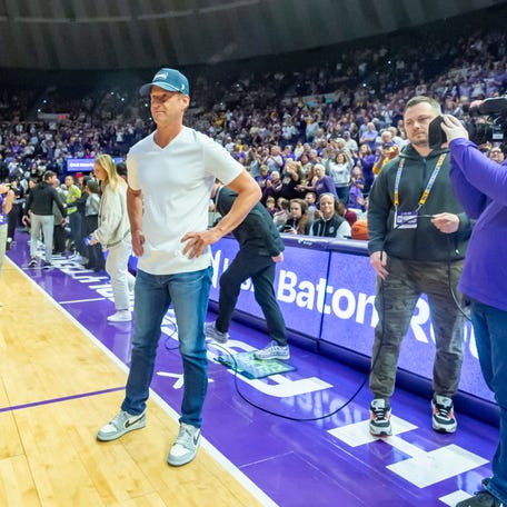 LSU Football Coach Lane Kiffin walks out with Tigers Basketball Coach Kim Mulkey, LSU Tigers Womens Basketball takes on the Kentucky Wildcats. Thursday, Jan. 1, 2026.