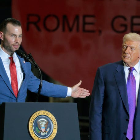 President Donald Trump looks on as Republican congressional candidate Clay Fuller speaks at the Coosa Steel Corporation in Rome, Georgia, on Feb. 19, 2026.