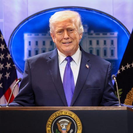 President Donald Trump gestures as he speaks during a press briefing at the White House, following the Supreme Court's ruling that Trump had exceeded his authority when he imposed tariffs, in Washington, D.C., February 20, 2026.