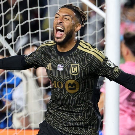 Denis Bouanga celebrates after scoring against Inter Miami.