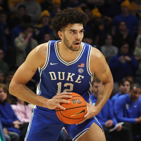 Feb 10, 2026; Pittsburgh, Pennsylvania, USA; Duke Blue Devils forward Cameron Boozer (12) handles the ball against the Pittsburgh Panthers during the first half at Petersen Events Center. Mandatory Credit: Charles LeClaire-Imagn Images
