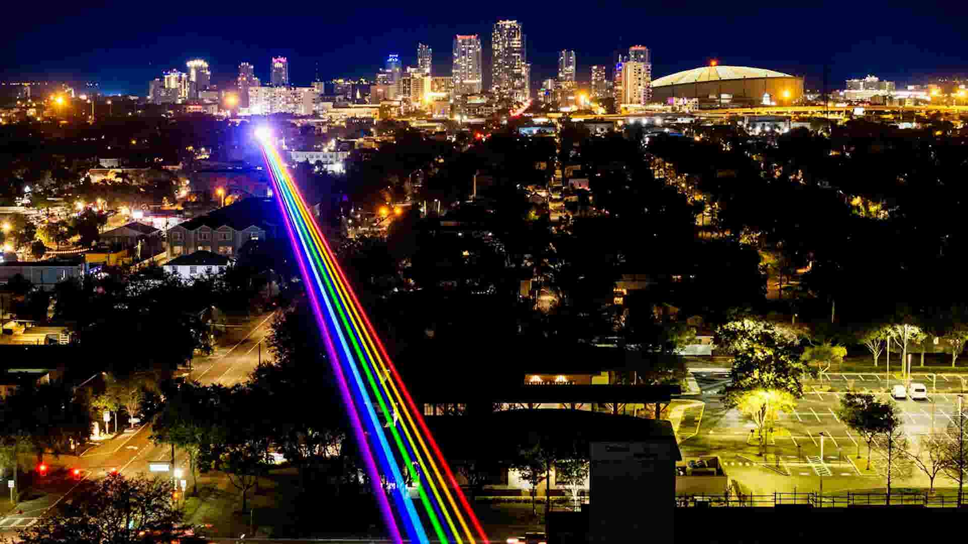 See rainbow light display light up sky over Florida