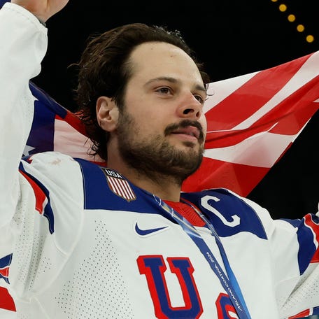 Auston Matthews of Team USA celebrates after the game against Team Canada during the Milano Cortina 2026 Olympic Winter Games.
