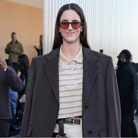 Caitlin Clark attends the Prada fashion show during Milan Fashion Week.