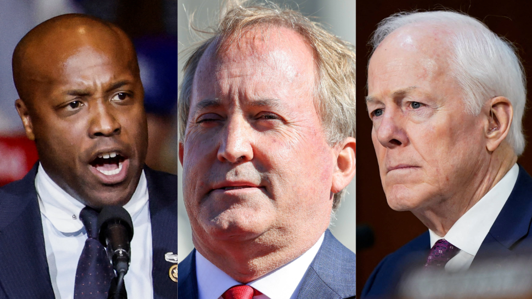 From left, U.S. Rep. Wesley Hunt, Texas Attorney General Ken Paxton and U.S. Sen. John Cornyn.
