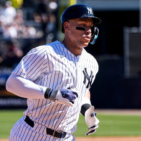New York Yankees right fielder Aaron Judge (99) bats a 2-run home run against Detroit Tigers during the third inning at George M. Steinbrenner Field in Tampa, Fla. on Saturday, Feb. 21, 2026.