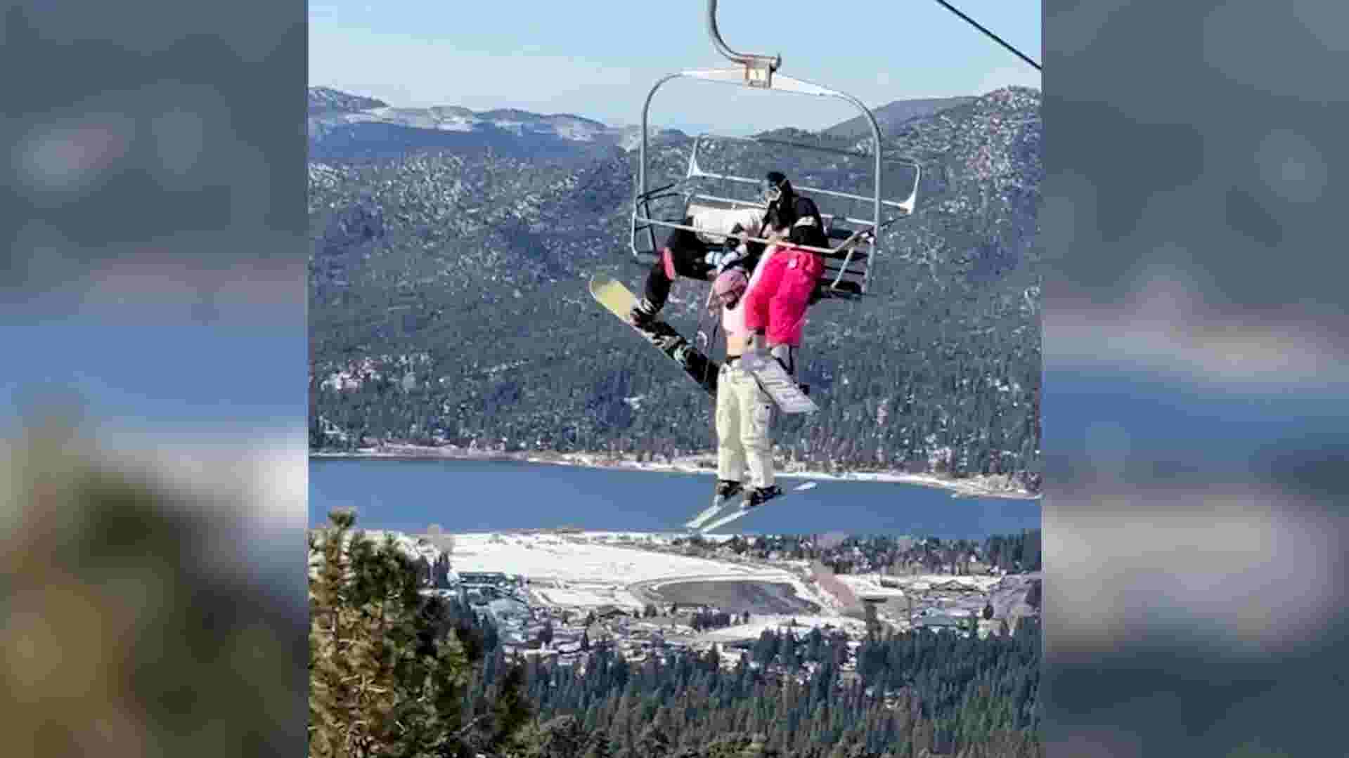 Shocking video shows skier hanging from chairlift