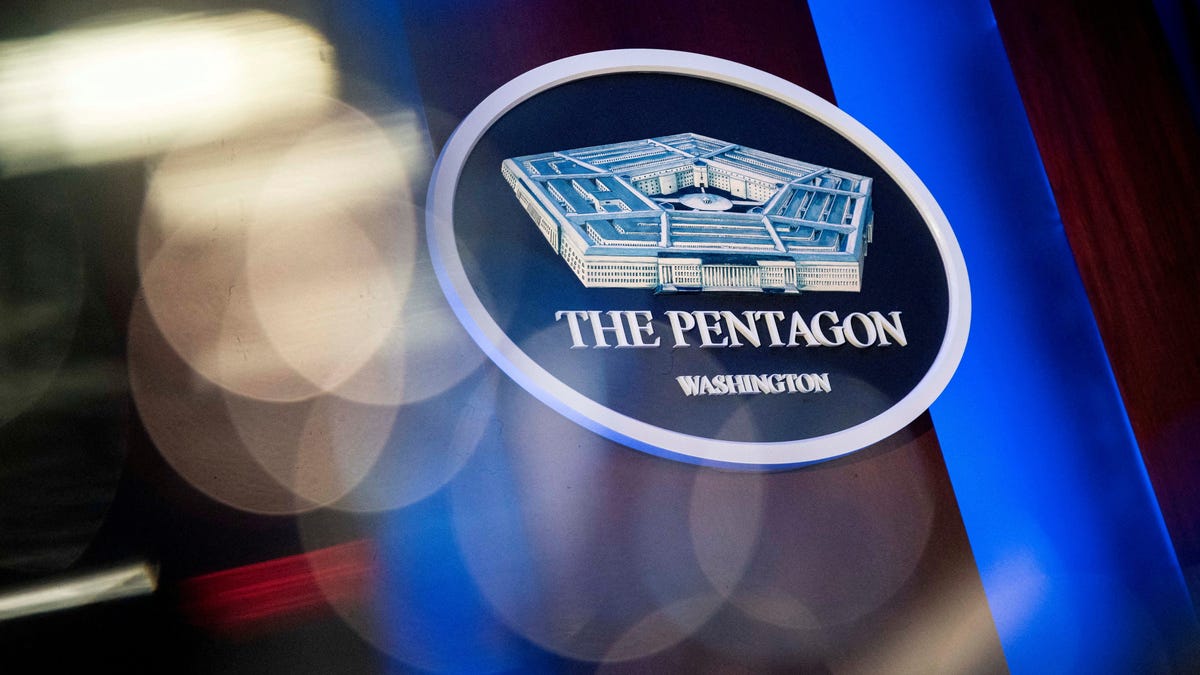 The Pentagon logo is seen behind the podium in the briefing room at the Pentagon in Arlington, Virginia, U.S., in this file photos from Jan. 8, 2020.