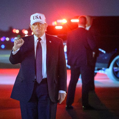 US President Donald Trump gestures as he arrives at Palm Beach International Airport in West Palm Beach, Florida on February 27, 2026. Trump is spending the weekend at his Mar-a-Lago resort. (Photo by Mandel NGAN / AFP via Getty Images)