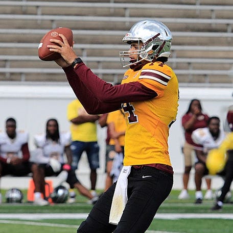 Bethune-Cookman QB Dominiq Ponder takes a snap during the Wildcats' spring game Saturday, April 22, 2023, at Daytona Stadium.    Bethune 10