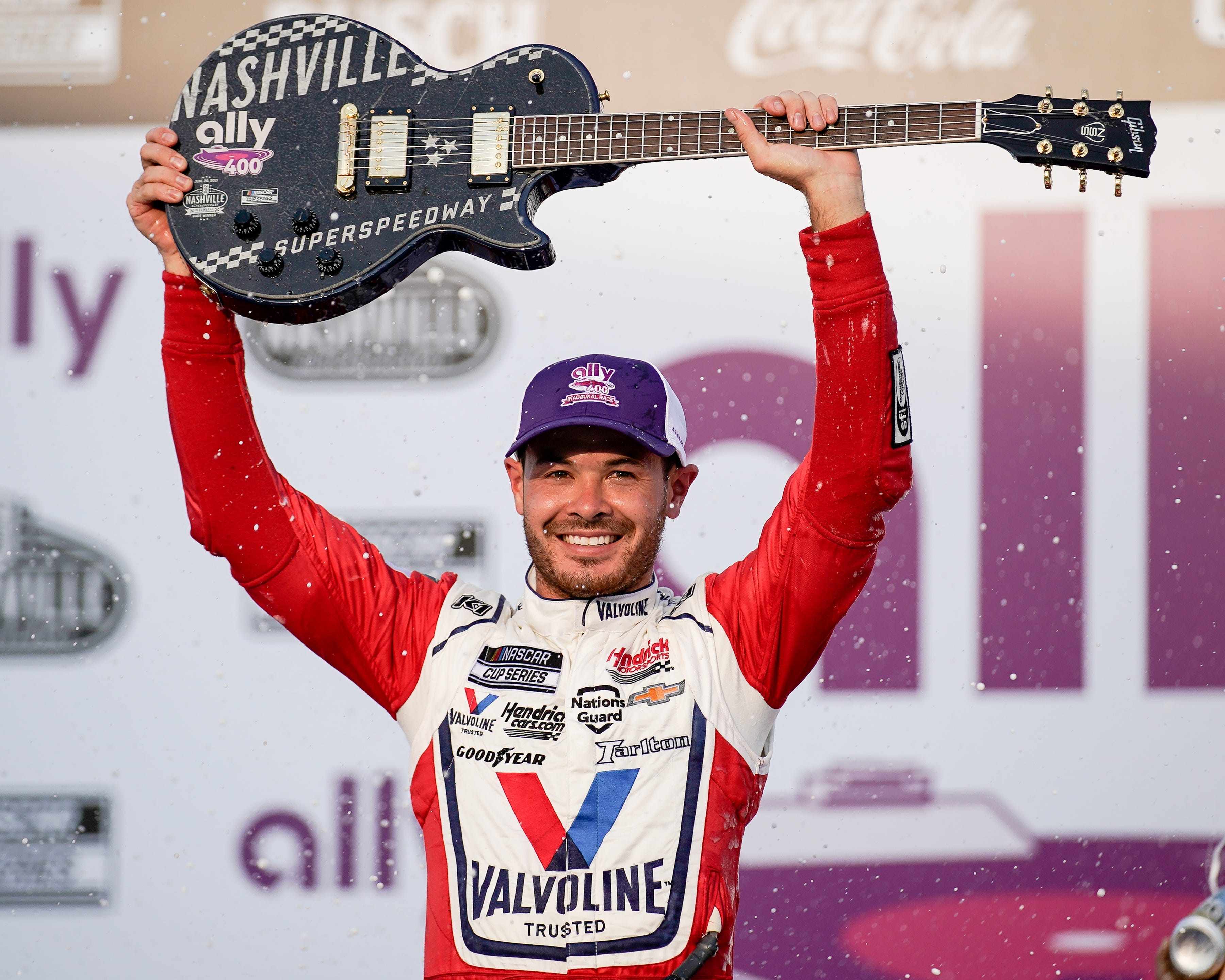 NASCAR Cup Series driver Kyle Larson celebrates after winning the NASCAR Cup Series Ally 400.